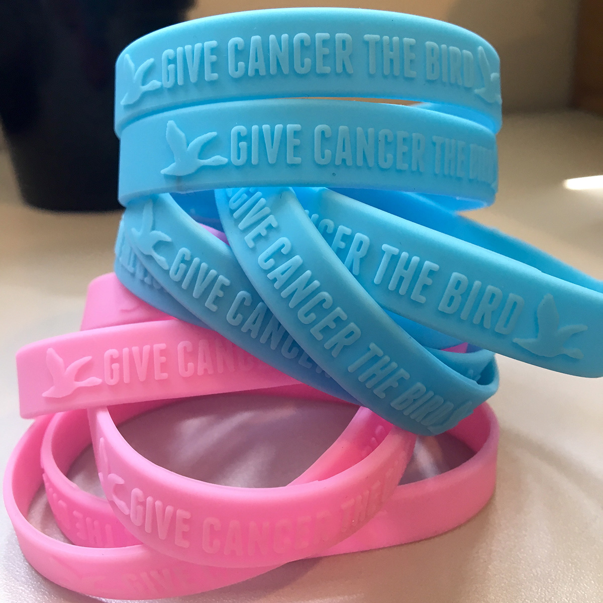 Give Cancer the Bird bracelets